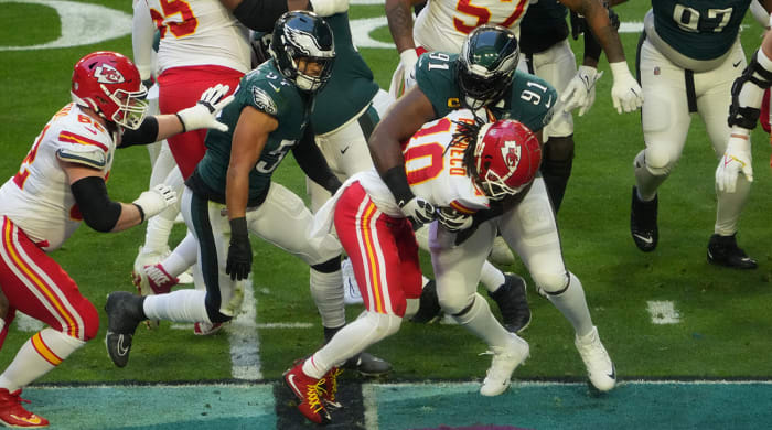 Fletcher Cox wraps up Isiah Pacheco during Super Bowl LVII
